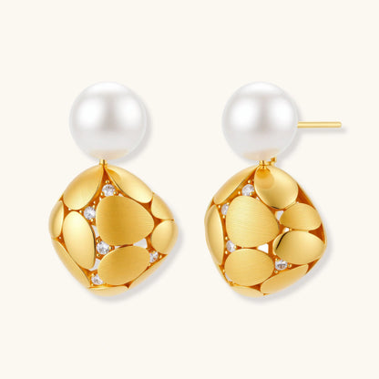 Gold-plated sterling silver drop earrings with white freshwater pearl studs and overlapping petal design with crystal accents